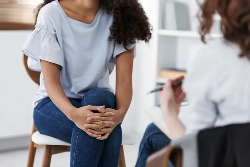 The importance of trauma counselling | Anonymous photo of two women during group psychotherapy for people with depression